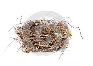 Isolated bird`s nest made of thin branches to lay eggs and breed offsprings on a white background photo