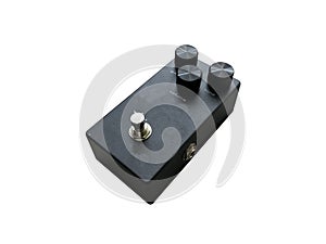 Isolated black sand texture overdrive and black knob stompbox electric guitar effect on white background with clipping path. music