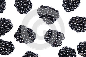 Isolated blackberries. Blackberry fruits isolated over white background with clipping path. Macro shot fresh juicy blackberry