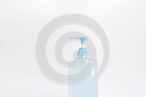 Isolated blue alcohol gel bottle and pump on white background