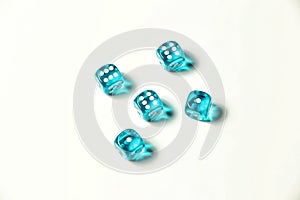 Isolated blue five pieces of transparent dice showing three six and two ones