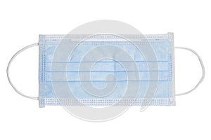 Isolated blue Surgical face mask for protection Corona virus or COVID 19 and dust PM 2.5 on white background . Healthcare and