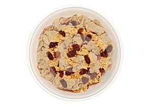 Isolated bowl of bran and raisin cereal