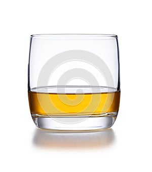 A isolated bowl style glass of whisky, shot on white