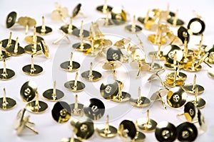 Isolated brass tacks