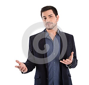 Isolated business man gesturing with his hands.