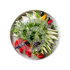 Isolated caucasian platter with fresh vegetables