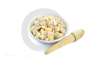 Isolated of Chopped Baby Corn in a little white bowl