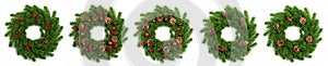 isolated christmas wreath and red balls on white