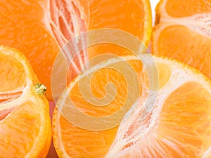 Isolated citrus collection. Whole tangerines or mandarin orange fruits and peeled segments isolated on white background