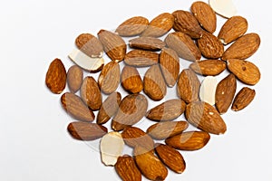 Isolated Close up, macrophotography, of dry roasted Almond nuts on white background. photo