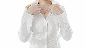 Isolated closeup image of woman decollete in white blouse photo