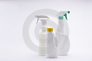 Isolated closeup of spray containers on a white background-concept COVID19 prevention