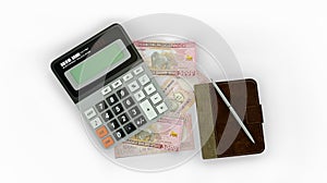 isolated composition of 5000 Rwandan franc notes, a calculator, a note book and a pen