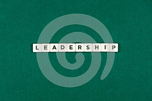Isolated concept of word leadership written with chips