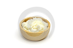Isolated Cooked Jasmine rice in the wooden bowl on white background