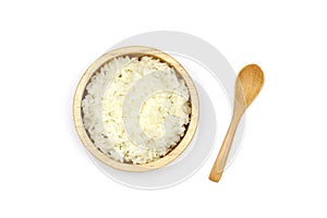Isolated Cooked Jasmine rice in the wooden bowl on white background