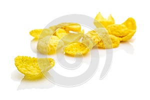 Isolated corn flakes on white. Snack Cereal yellow Healthy Cornflakes - Superfood background. Vegan gluten-free organic, healthy