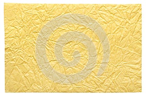 Isolated crumpled sheet paper in excellent light yellow color.