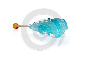 Isolated crystal sugar candy on a stick