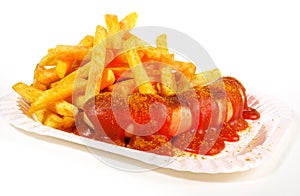 Isolated Curry Wurst with French Fries