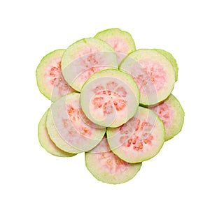 Isolated cut guava fruits. Pieces of green pink fleshed guavas isolated on white background with clipping path