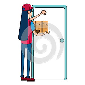 Isolated delivery girl with a package knocking a door