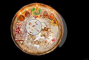 Isolated diwali cultural praying decorated plat for hindu goddess lakshmi