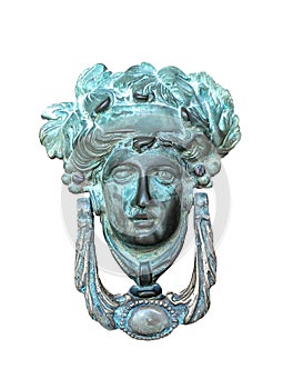 Isolated door knocker â€“ antique head on the entrance of a house on Malta. Italian traditional doorknob on white background . Old