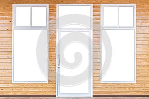 Isolated of door and windows frame on bright pine wooden wall