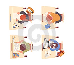 Isolated of elementary school students studying and learning at classroom sitting at desk top view