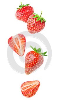 Isolated falling strawberries