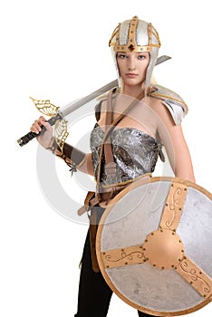 Isolated female warrior with helmet and shield