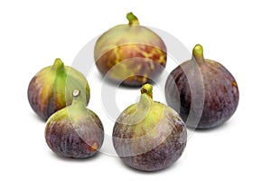 Isolated figs. One and a half fresh fig fruits isolated on white background 2