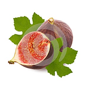 Isolated figs. Ripe juicy raw fig fruit, cut half with pulp and seeds and green fresh leaf isolated on white background with