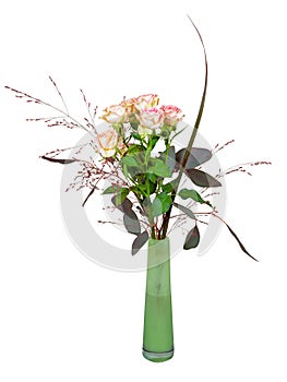 Isolated flower arrangement with a rose in a glass vase