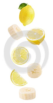 floating isolated on white background lemon fruits and bananas photo