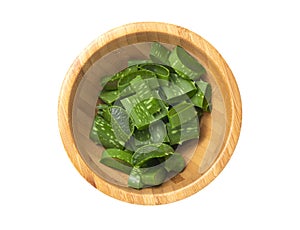 Isolated of fresh Aloe Vera slice  in wooden bowl on white background with clipping path. Aloe Vera is herbal for treatment skin