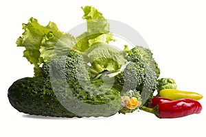 Isolated fresh broccoli and tomatos, pepper and salad