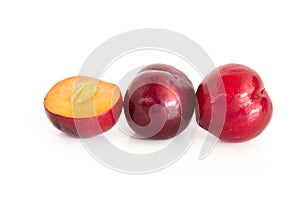 Isolated of Fresh red cherry plum on white background