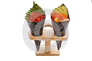 Isolated Fried Shirauo and Tempura California or Temaki Sushi Hand Roll on Wood Stand