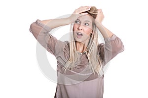 Isolated frustrated shouting woman with hands up on white background