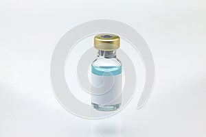 Isolated glass vaccine bottle with colored liquid very close high magnification mockup