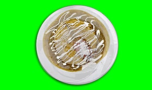 Isolated green enchiladas in a white plate