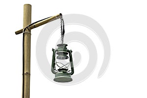 Isolated Green Lantern hanging on bamboo poles on a white background with clipping path