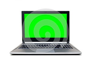 Isolated grey and black laptop with green screen