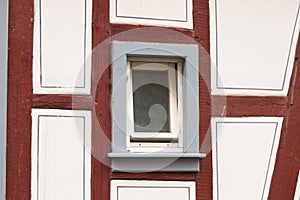 Isolated grey window of an half-timbered house