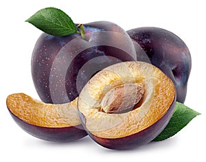 Isolated group of plums. Two whole, piece and half of plum with leaves isolated on white background with clipping path.