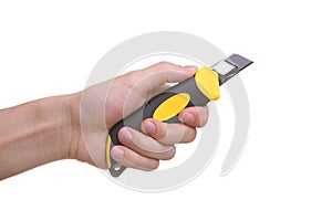 Isolated hand holding cutting knife tool