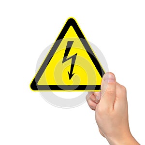 Isolated hand holding sign of danger high voltage